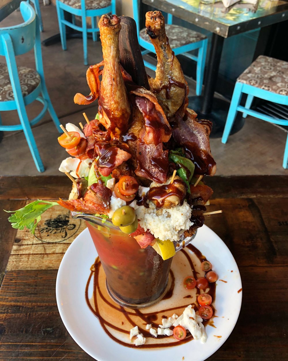 This Bloody Mary has a WHOLE CHICKEN in IT…